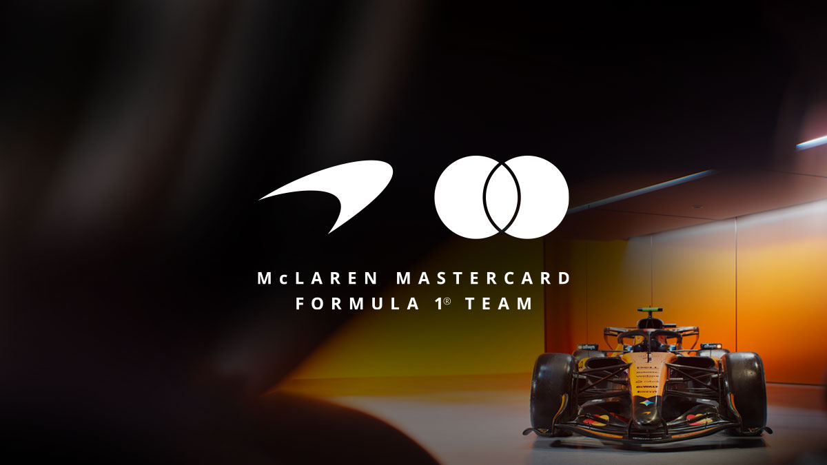 McLaren Mastercard Formula 1 Team logo over a stylized photo of part of an F1 racing car.