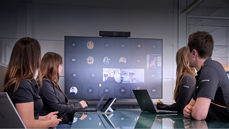 Cisco collaboration monitor displaying multiple remote participants
