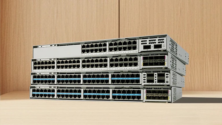 Four Cisco Smart Switches stacked vertically.